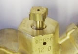 Propane bleeder valve opening on service valve